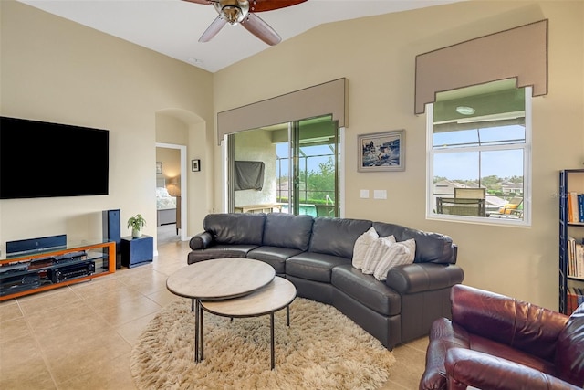 living room featuring plenty of natural light, ceiling fan, and light tile patterned floors