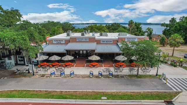 view of building exterior featuring a water view