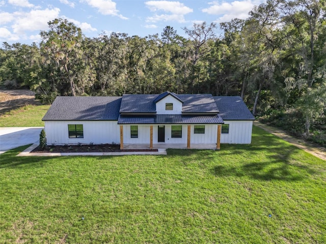 view of front of home with a front lawn and a porch