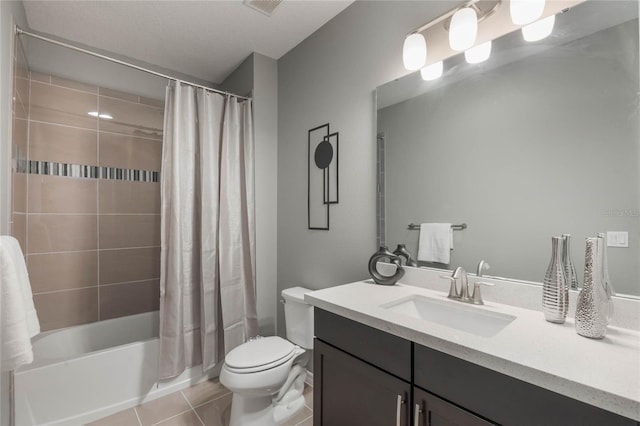 full bathroom with tile patterned floors, vanity, shower / bathtub combination with curtain, and toilet