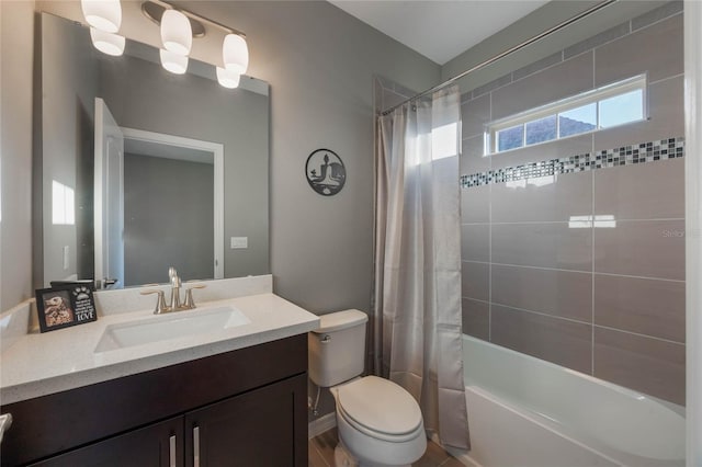 full bathroom with vanity, shower / bathtub combination with curtain, and toilet