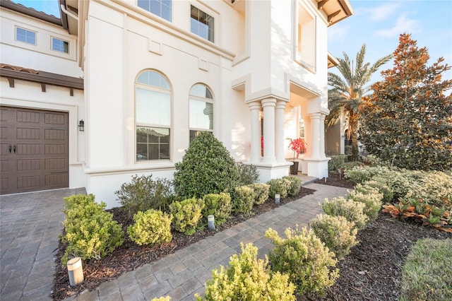 property entrance with a garage