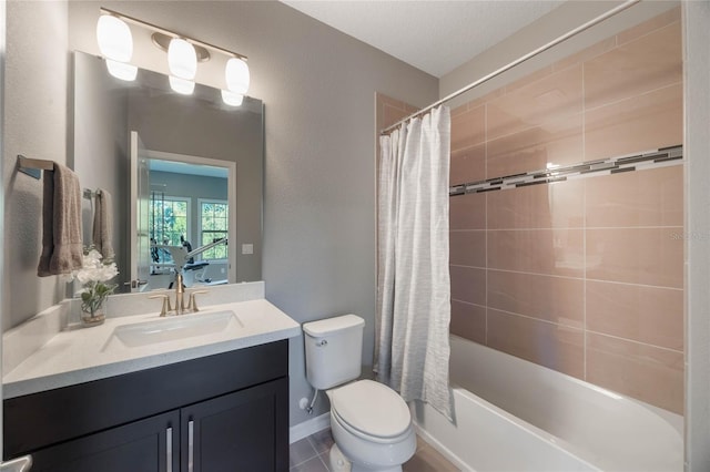 full bathroom featuring vanity, toilet, shower / bathtub combination with curtain, and a textured ceiling