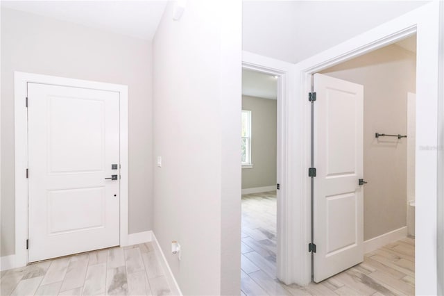 entryway with light hardwood / wood-style flooring