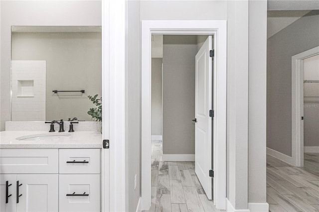 12220 SW 76th Ln, Dunnellon, FL 34432 - bathroom featuring vanity, marble finish floors, and a spacious closet