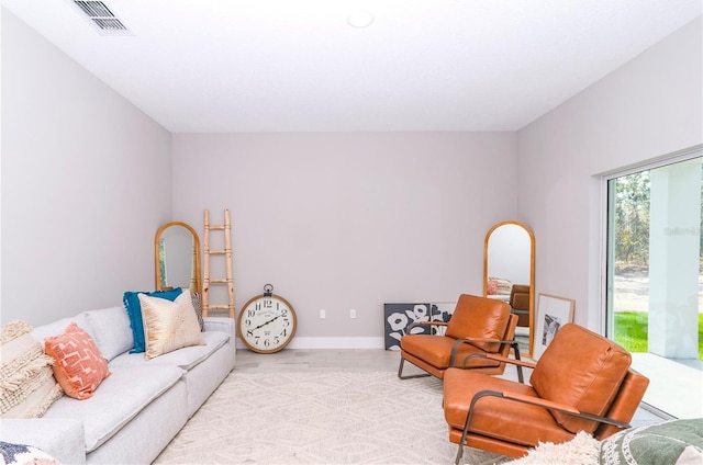 12220 SW 76th Ln, Dunnellon, FL 34432 - living area featuring baseboards and light wood-style flooring