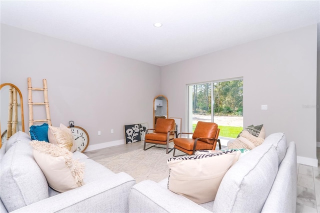 living room with light hardwood / wood-style flooring