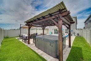 view of patio featuring a pergola and a hot tub