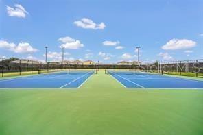 view of sport court with basketball hoop