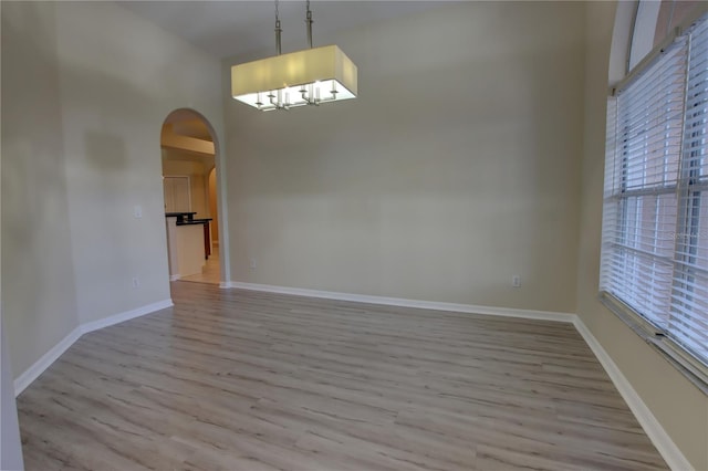 unfurnished dining area with light hardwood / wood-style floors