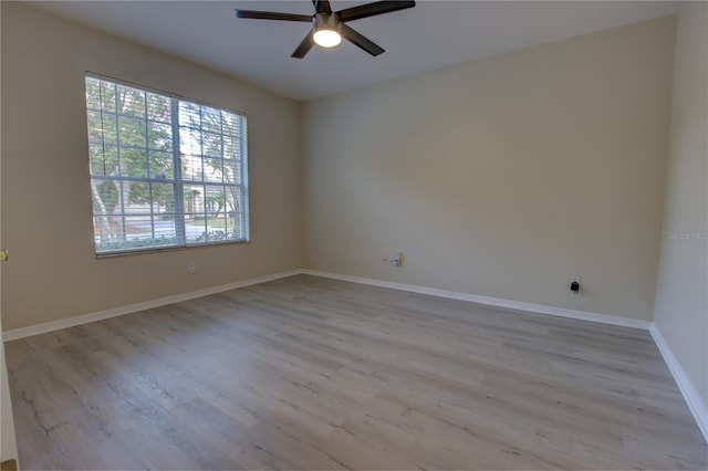 unfurnished room with light hardwood / wood-style floors and ceiling fan