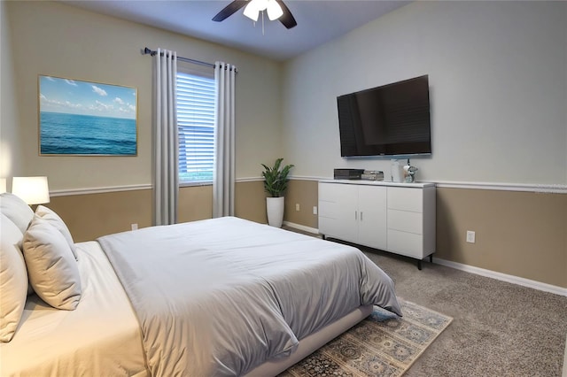 bedroom featuring ceiling fan and carpet floors