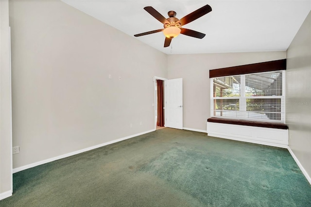 unfurnished room with dark colored carpet, ceiling fan, and lofted ceiling