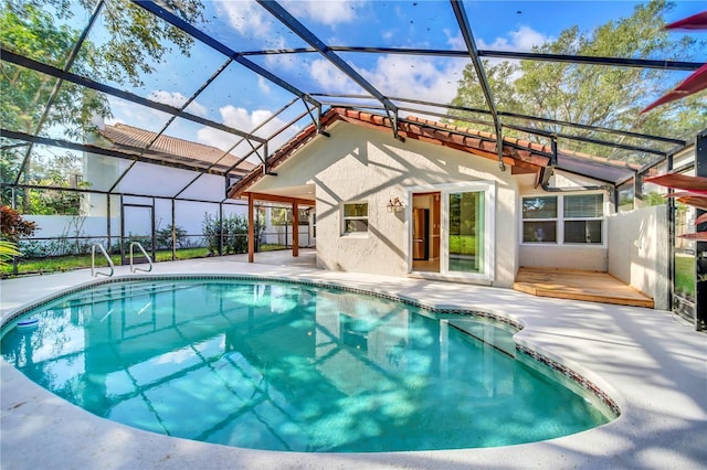 view of pool featuring a patio and a lanai