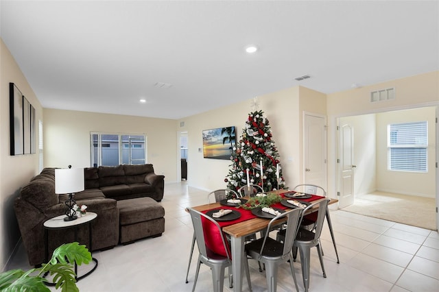 dining space with light tile patterned floors