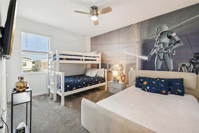 carpeted bedroom featuring ceiling fan and vaulted ceiling