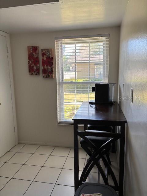 office featuring light tile patterned flooring