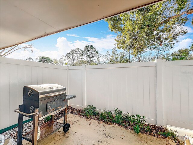 view of patio / terrace with fence