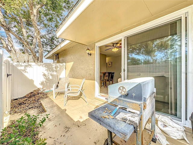 view of patio / terrace with fence and grilling area