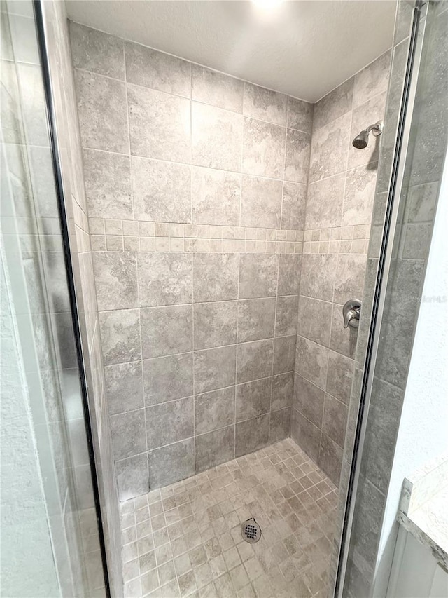 bathroom featuring a stall shower