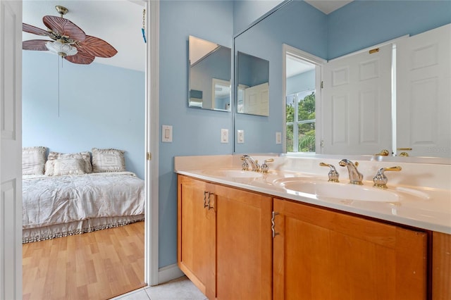 bathroom featuring vanity and hardwood / wood-style flooring