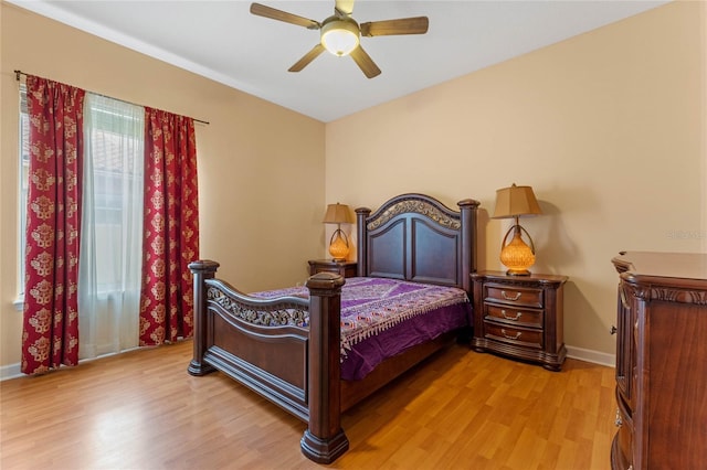 bedroom featuring light hardwood / wood-style flooring and ceiling fan