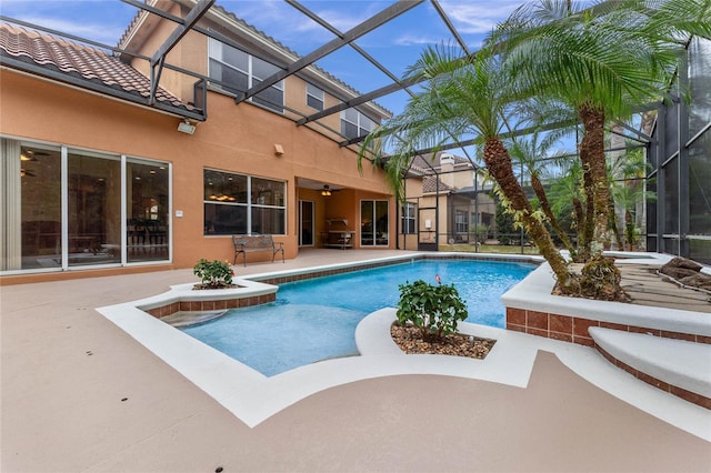 view of pool with a lanai and a patio area