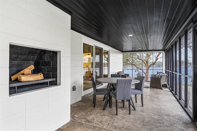 sunroom with a water view