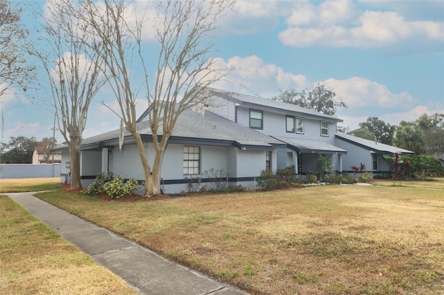 view of front of house with a front lawn