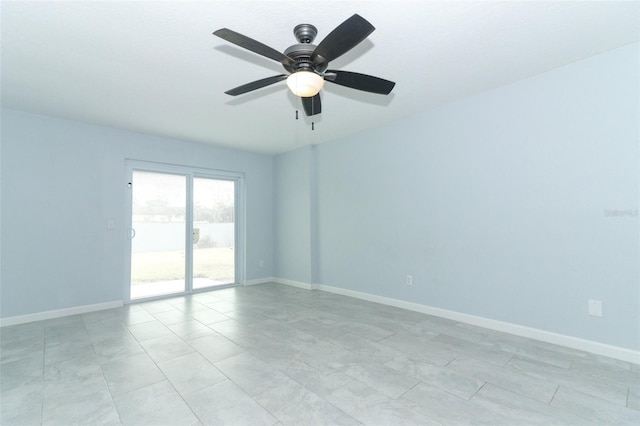 unfurnished room with ceiling fan