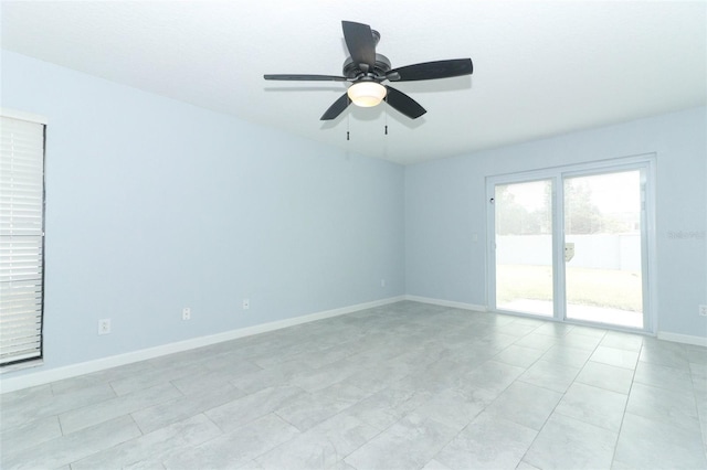 empty room featuring ceiling fan