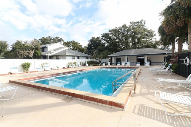 view of pool featuring a patio