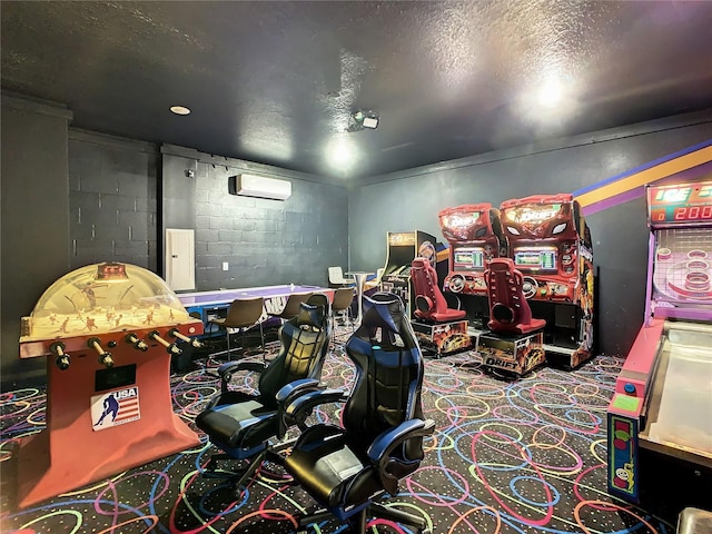 1670 Moon Valley Dr, Davenport, FL 33896 - recreation room with carpet, concrete block wall, an AC wall unit, and a textured ceiling