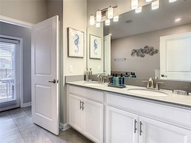 bathroom featuring tile patterned floors and vanity