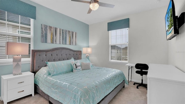 carpeted bedroom featuring ceiling fan