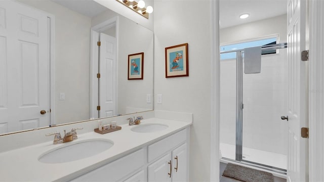 bathroom featuring vanity and walk in shower