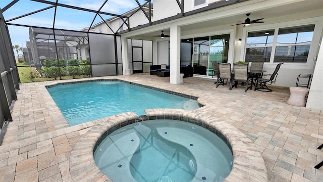 view of swimming pool featuring ceiling fan, a patio area, an outdoor living space, and an in ground hot tub