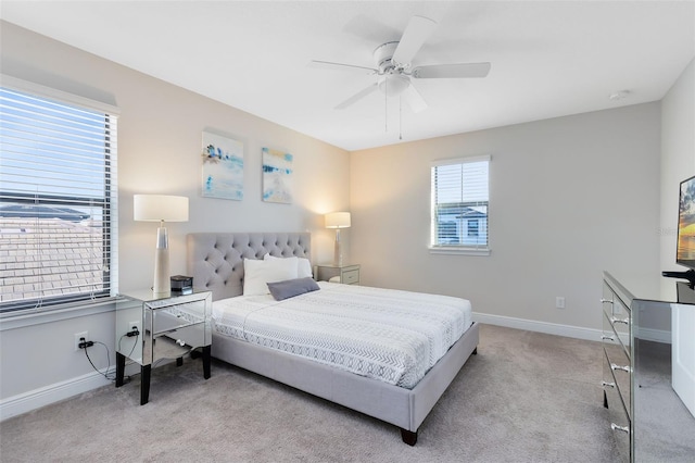 bedroom featuring ceiling fan and light colored carpet