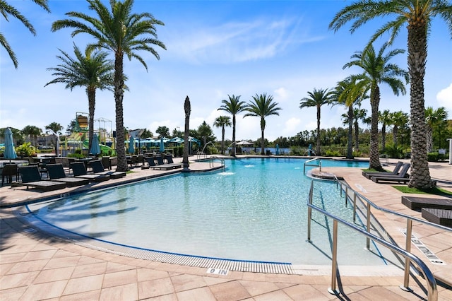 view of swimming pool featuring a patio