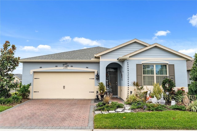 view of front of home with a garage