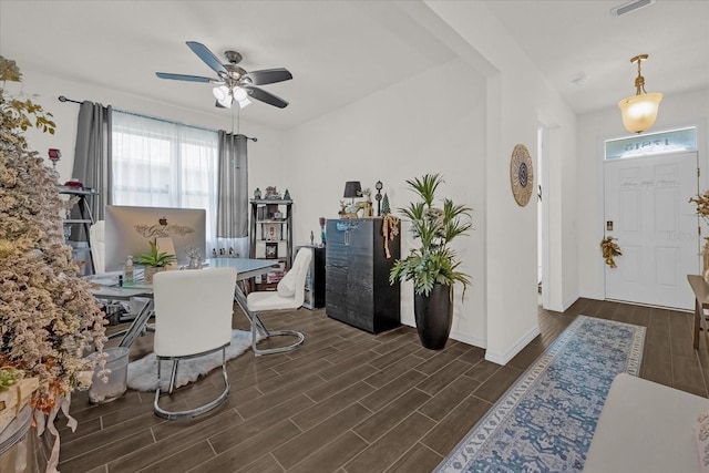 interior space with dark hardwood / wood-style floors and ceiling fan