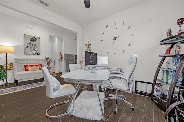 office area with dark hardwood / wood-style floors and ceiling fan