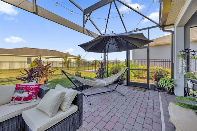 view of patio with a lanai