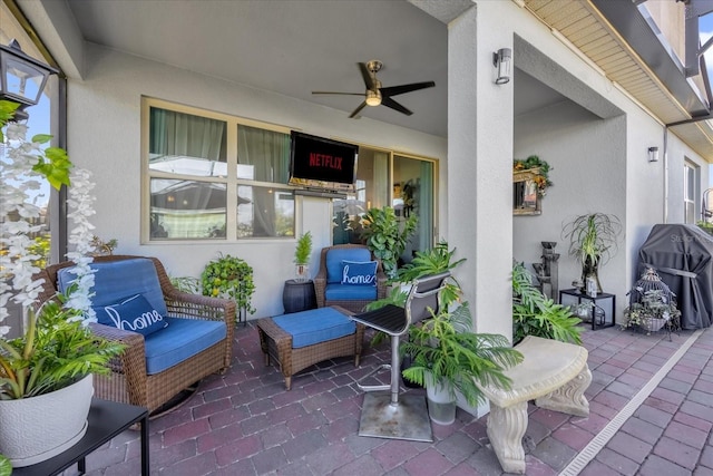 view of patio with ceiling fan