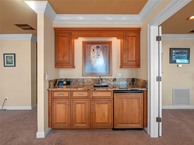 bar with sink, crown molding, light carpet, and stone counters