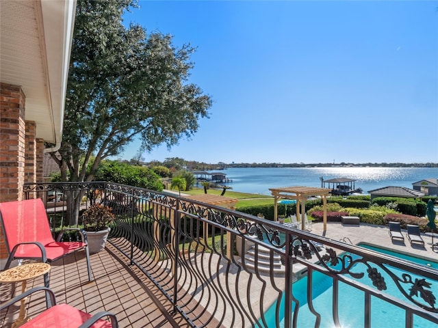 balcony featuring a water view