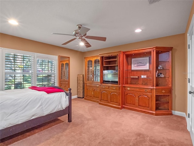 carpeted bedroom featuring ceiling fan