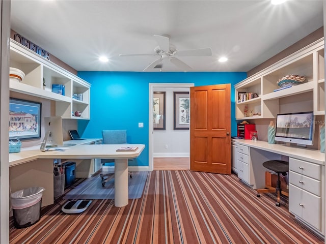 office featuring built in desk and ceiling fan