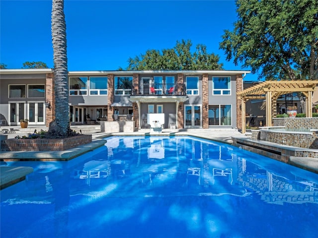 view of pool featuring a pergola