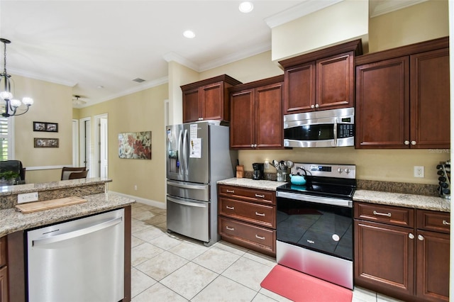 kitchen with pendant lighting, crown molding, appliances with stainless steel finishes, light stone counters, and a chandelier